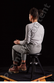 Zahara  1 brown workers dressed grey sweatshirt grey trousers…